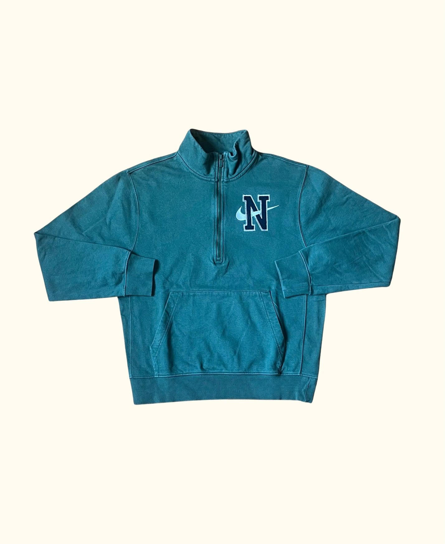 https://canallavintage.es/producto/sudadera-media-cremallera-verde-nike-vintage-2000s/