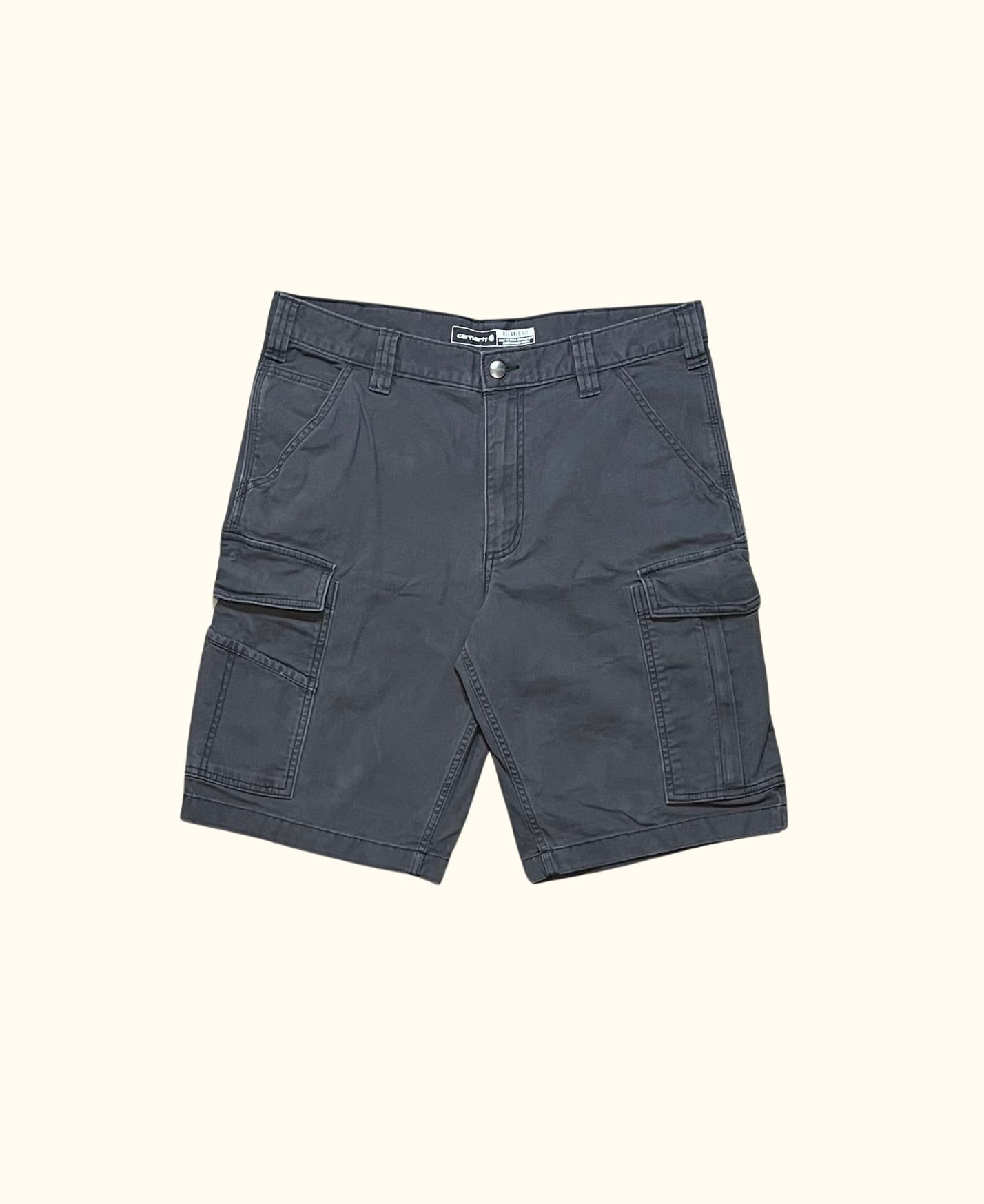 https://canallavintage.es/producto/pantalon-corto-bermudas-canvas-cargo-work-short-carhartt-vintage-2000s/
