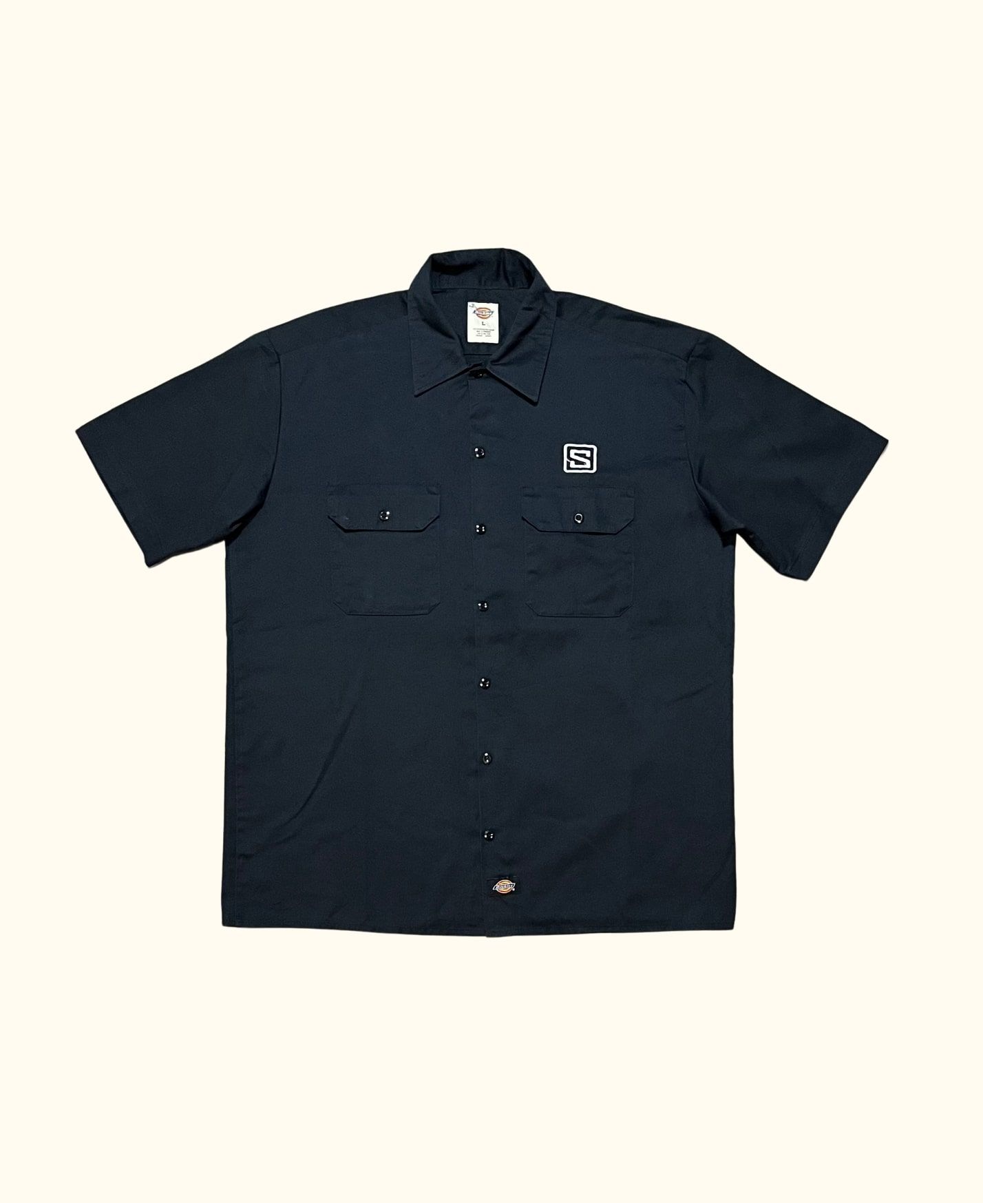 https://canallavintage.es/producto/camisa-manga-corta-workwear-bolsillos-dickies-vintage-2000s-4/