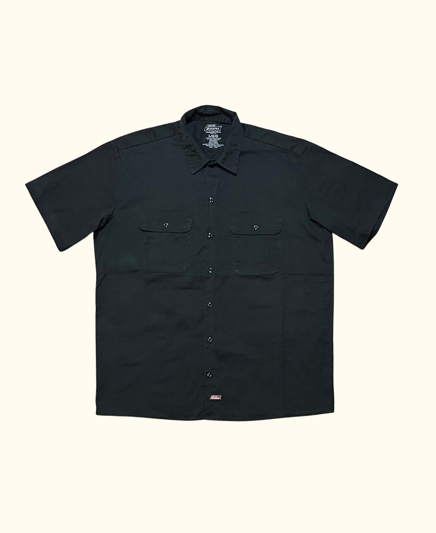 https://canallavintage.es/producto/camisa-manga-corta-bolsillos-dickies-vintage-2000s-2/