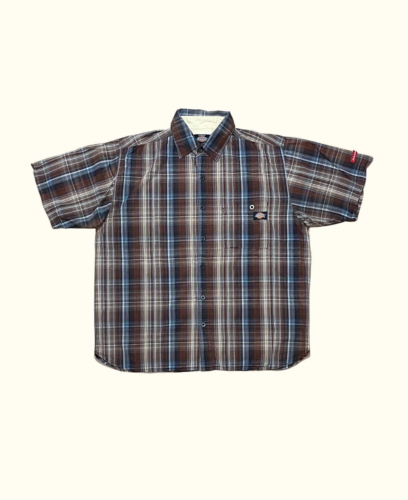https://canallavintage.es/producto/camisa-manga-corta-bolsillos-dickies-vintage-2000s-2/