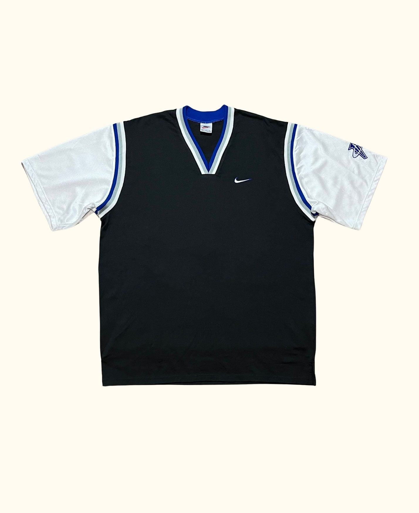 https://canallavintage.es/producto/camiseta-manga-corta-nike-basket-vintage-2000s/